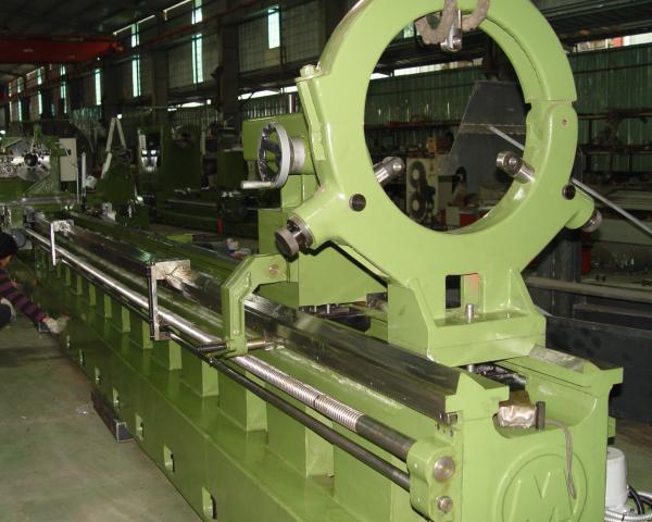 a large steady rest on a long lathe