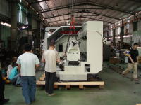 A tailstock end view of the DY-1200 x 5000 on its shipping skid