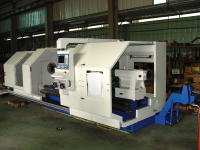 Showing the Annn Yang 1500 x 2000 CNC lathe fitted with the optional chip conveyor