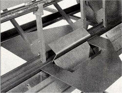 forming a lip in a port on a sheet