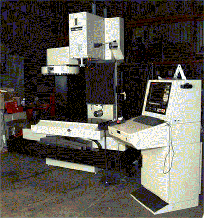 The HH Roberts horizontal vertical machining center with horizontal spindle in the low and extended position